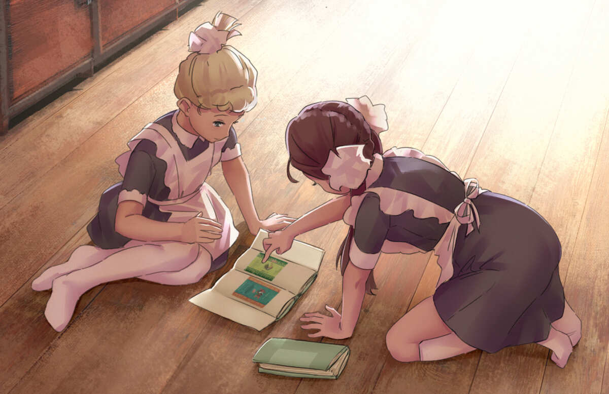 两个女孩阅读书籍